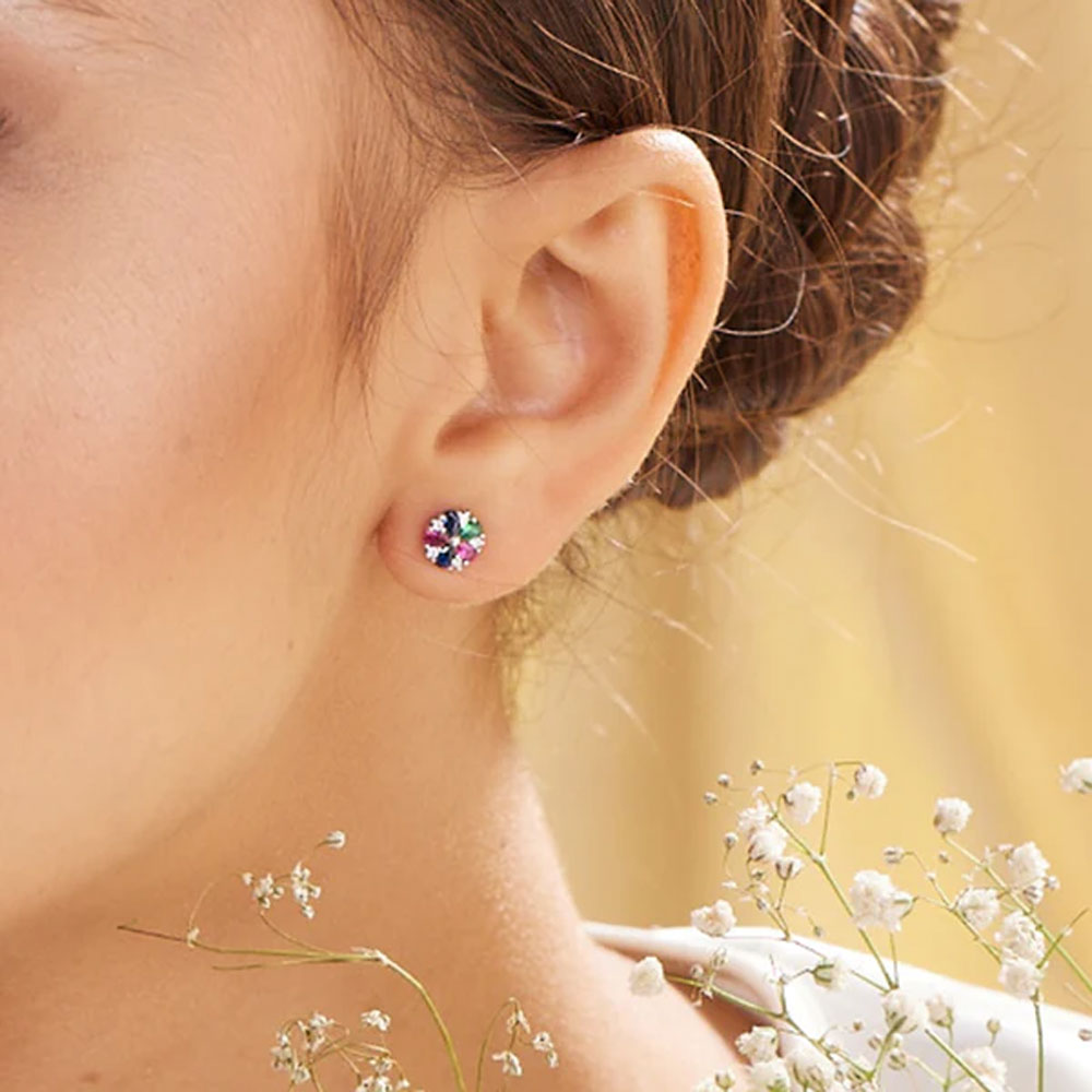 Sky Blue Topaz and 1/6 Carat T.W. Diamond 10K Gold Halo Button Stud Earrings  | Gold halo, Sky blue topaz, Stud earrings